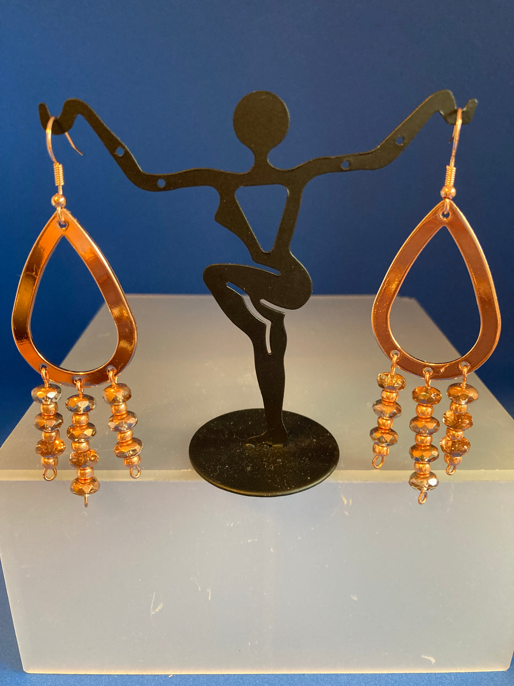 Teardrop earrings with dangling beads