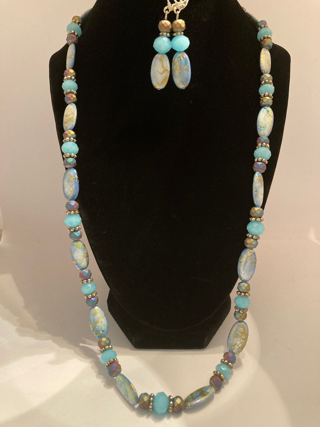 Novelty oval beads with matte multi-color stone beads necklace and matching earrings.