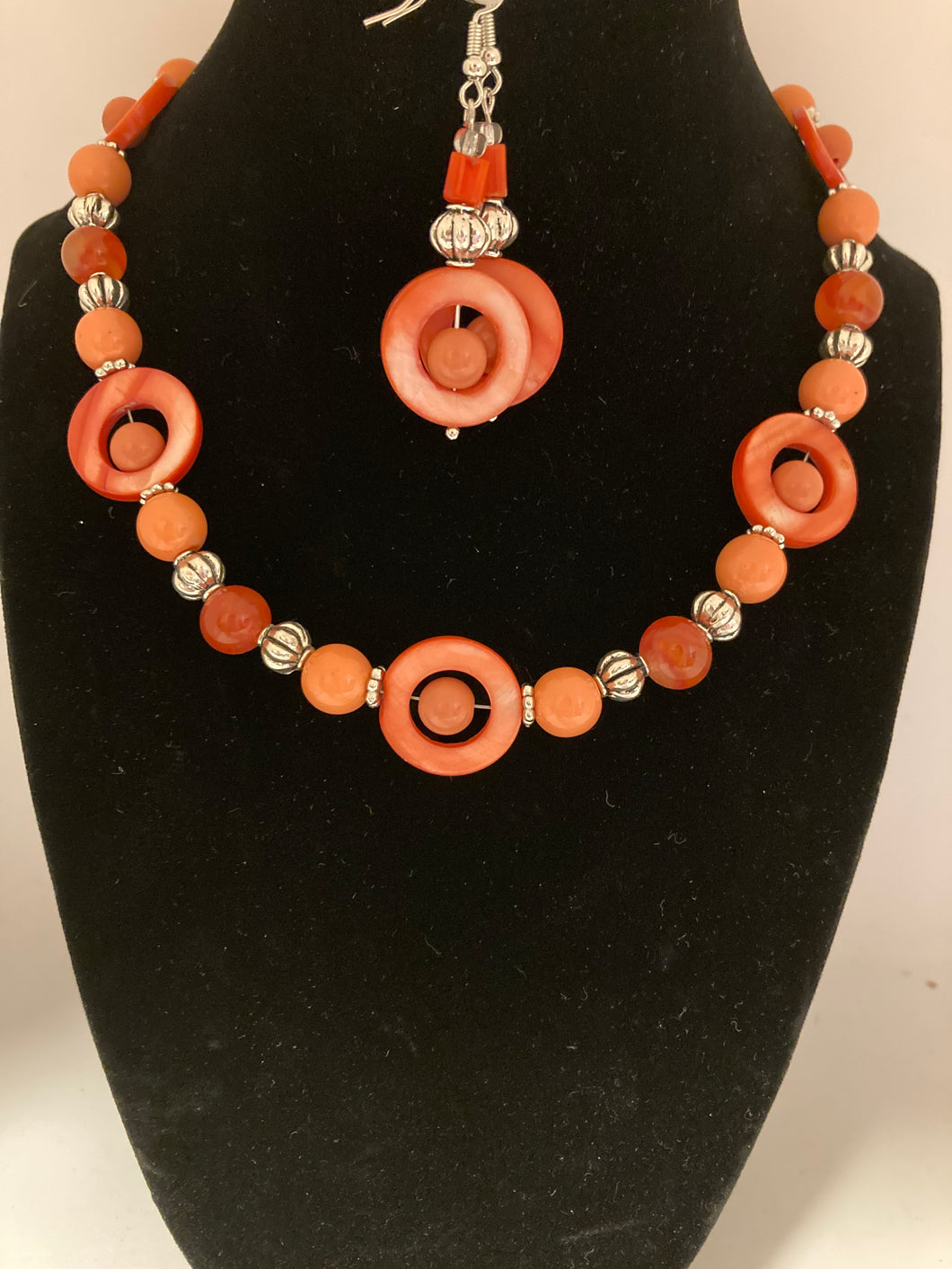 Coral necklace and earring set with assorted novelty beads