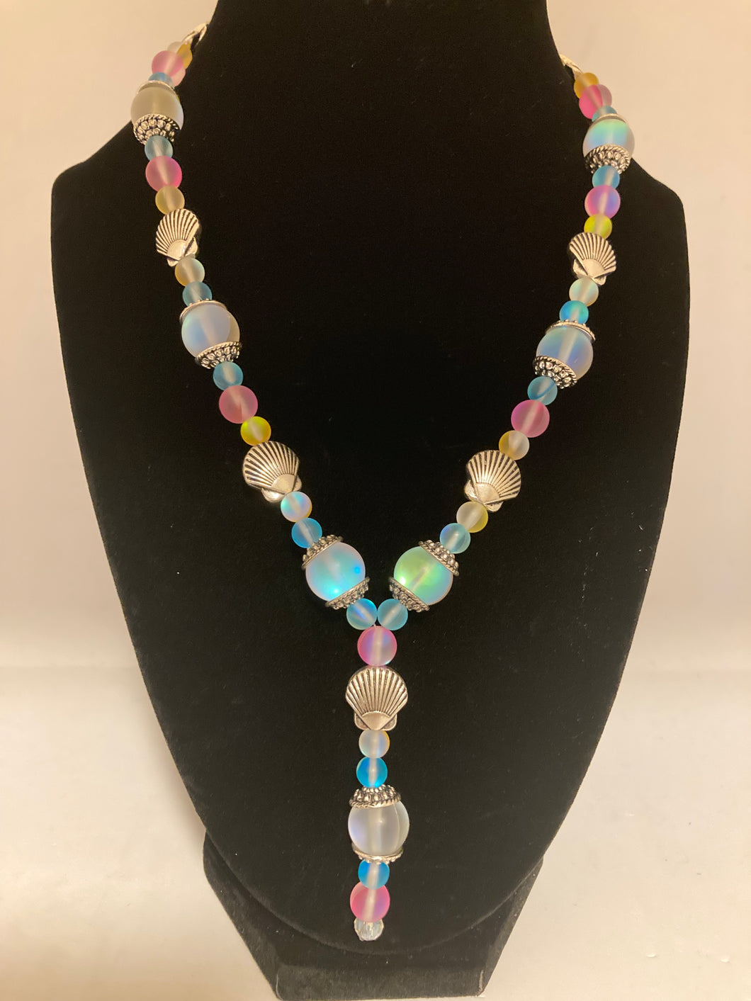 Multi-color pastel necklace with dangling earrings,