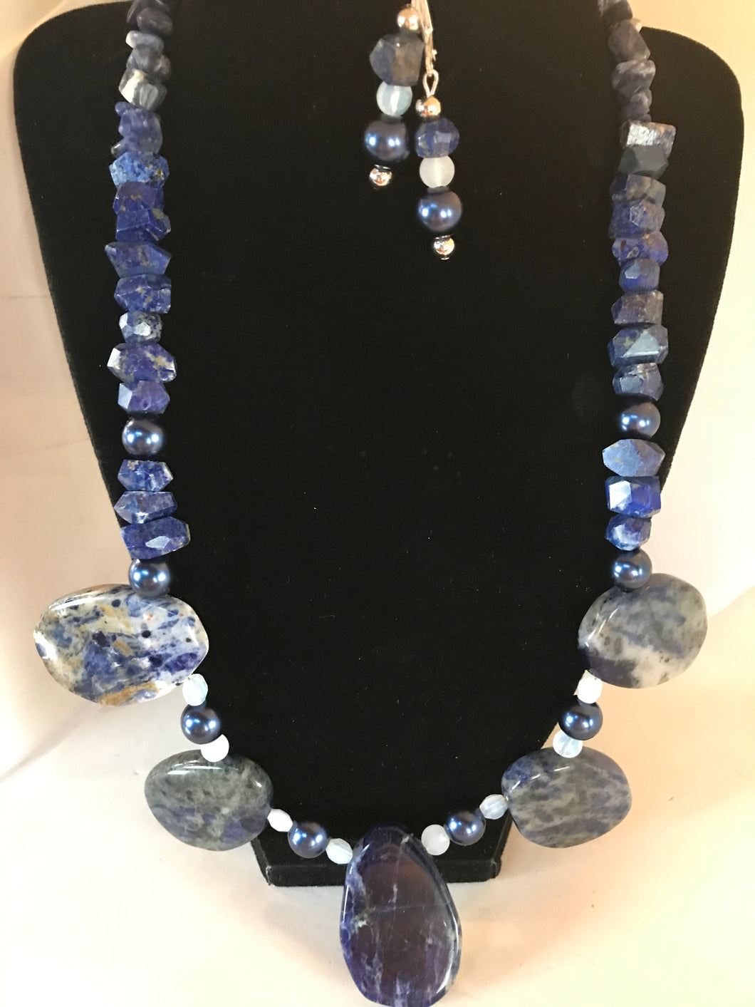 Sodalite semi precious stones with matching earrings.