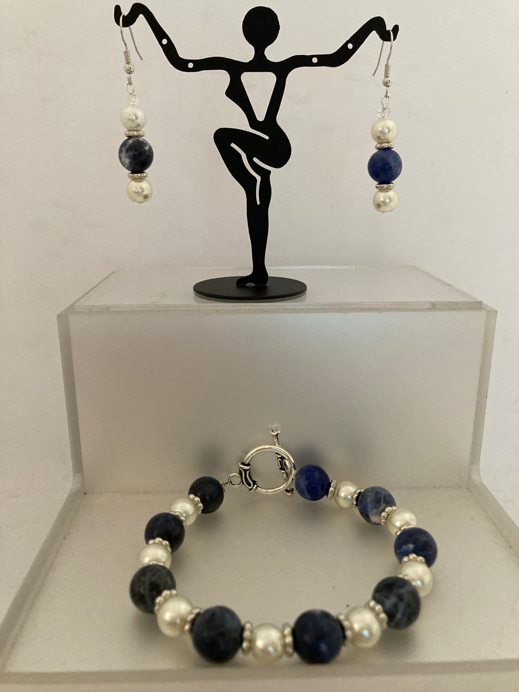 Sodalite and pearl bracelet with matching earring set.