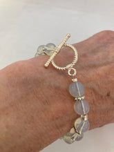Load image into Gallery viewer, Opal beaded bracelet with toggle closure and matching earrings set.
