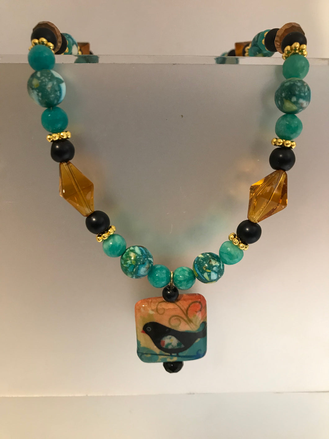 Decoupage bird bead with assorted glass beads choker and matching earrings