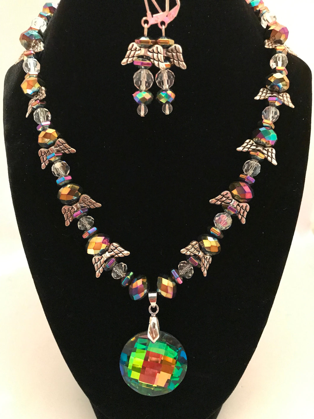 Irridescent multi-color round pendant and rainbow glass beads with angel charms and matching earrings