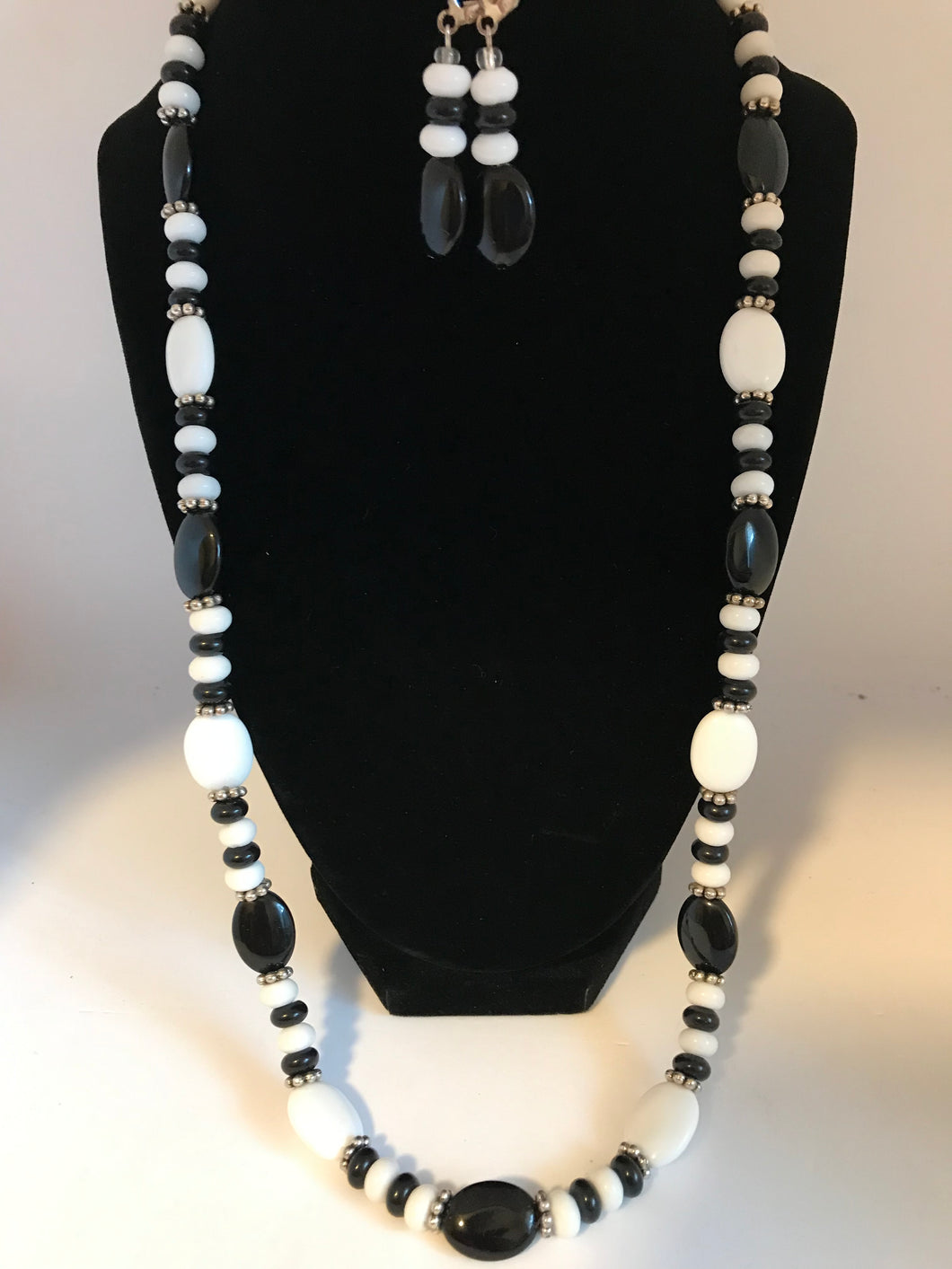 Black and white long necklace with matching earrings