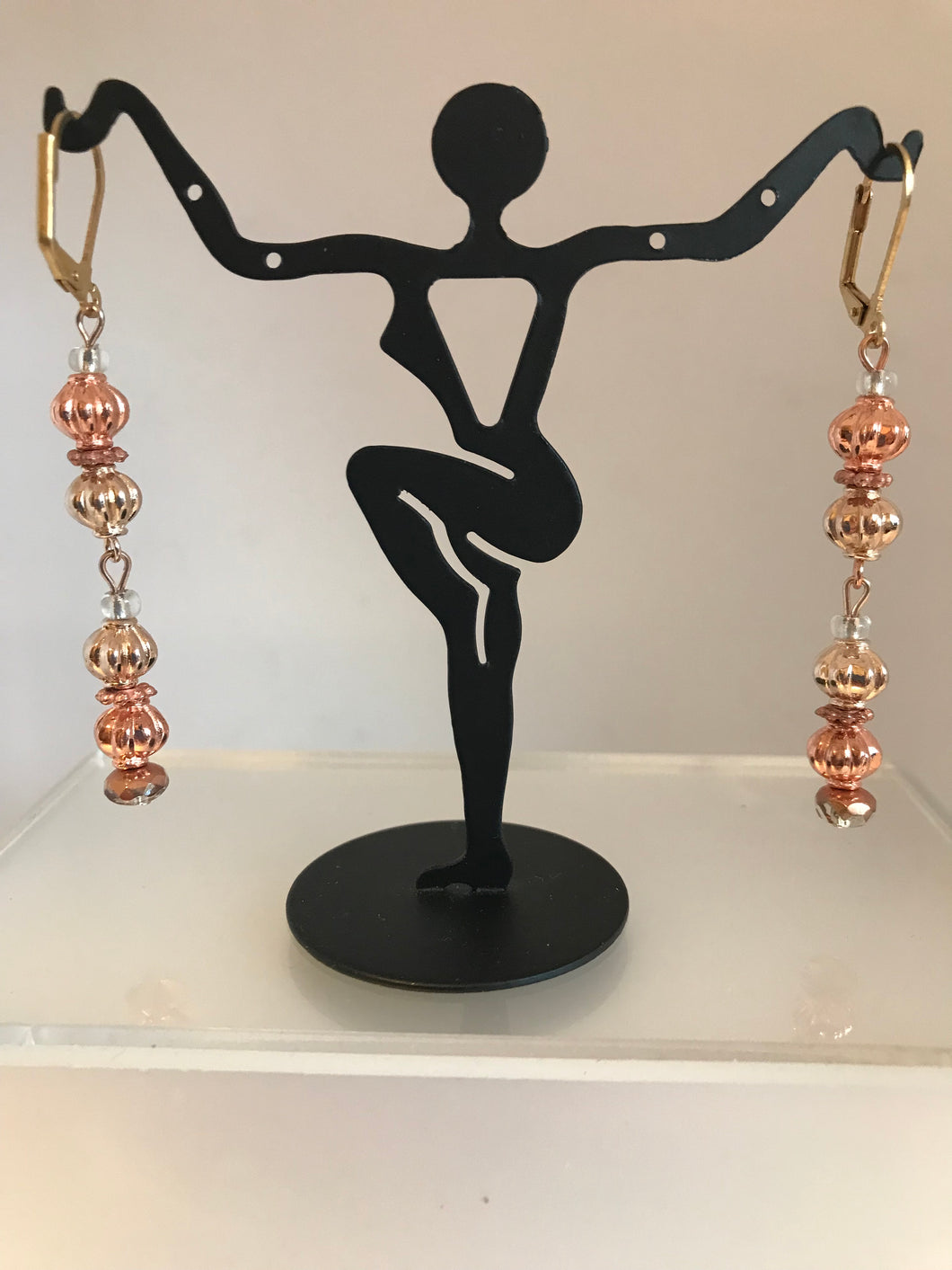 Rose gold and silver dangling earrings
