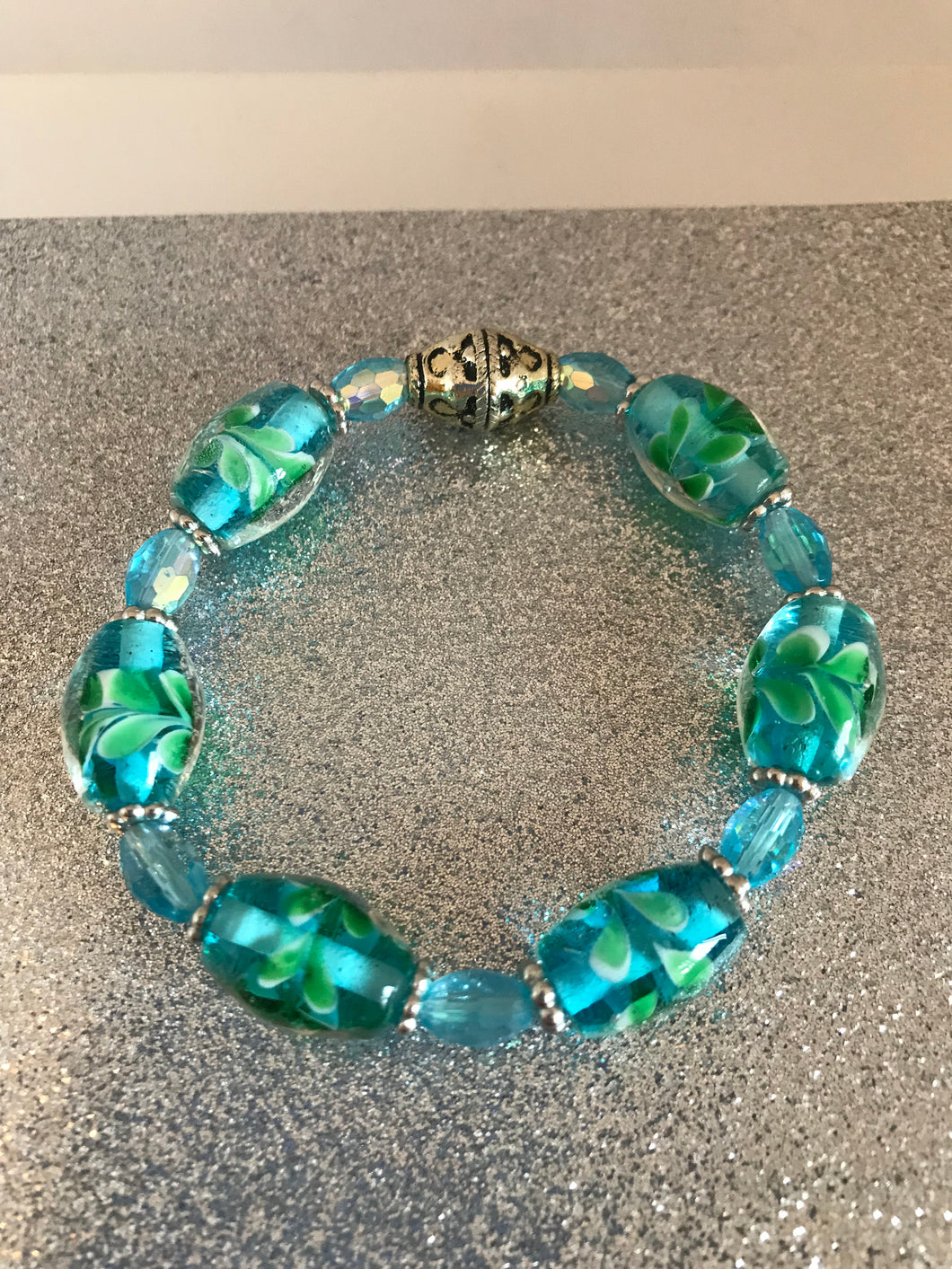 Green and aqua novelty beads stretch bracelet
