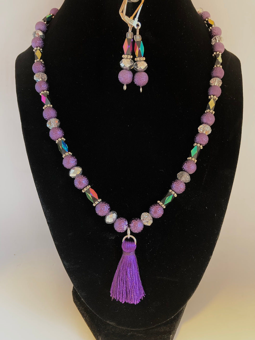 Purple tassle necklace and earrings