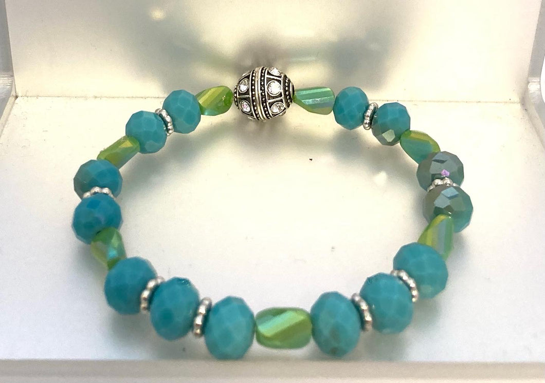 Glass faceted aqua and green stretch bracelet with matching earrings set.